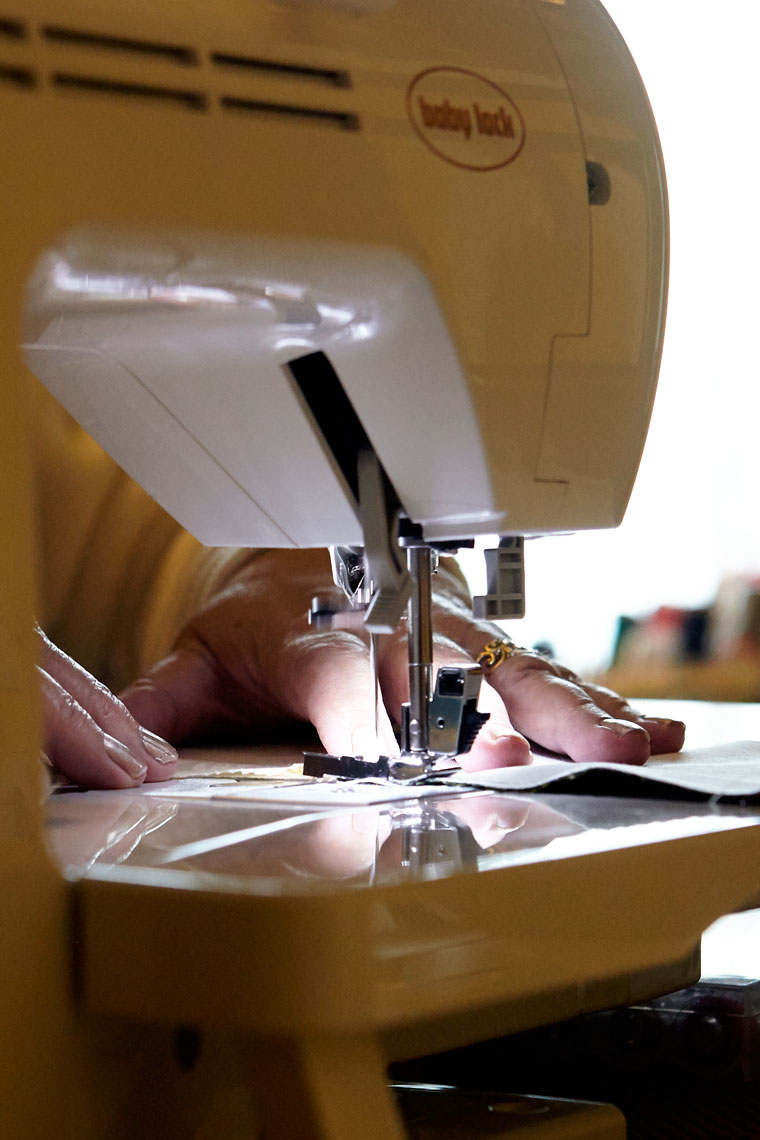  Hands at Sewing Machine